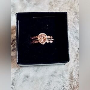 Elegant Rose Gold Halo Engagement Ring with Intricate Band Design